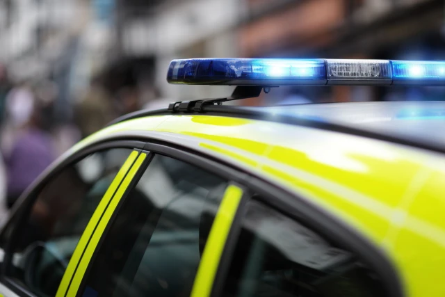 Up-close side view of a police car